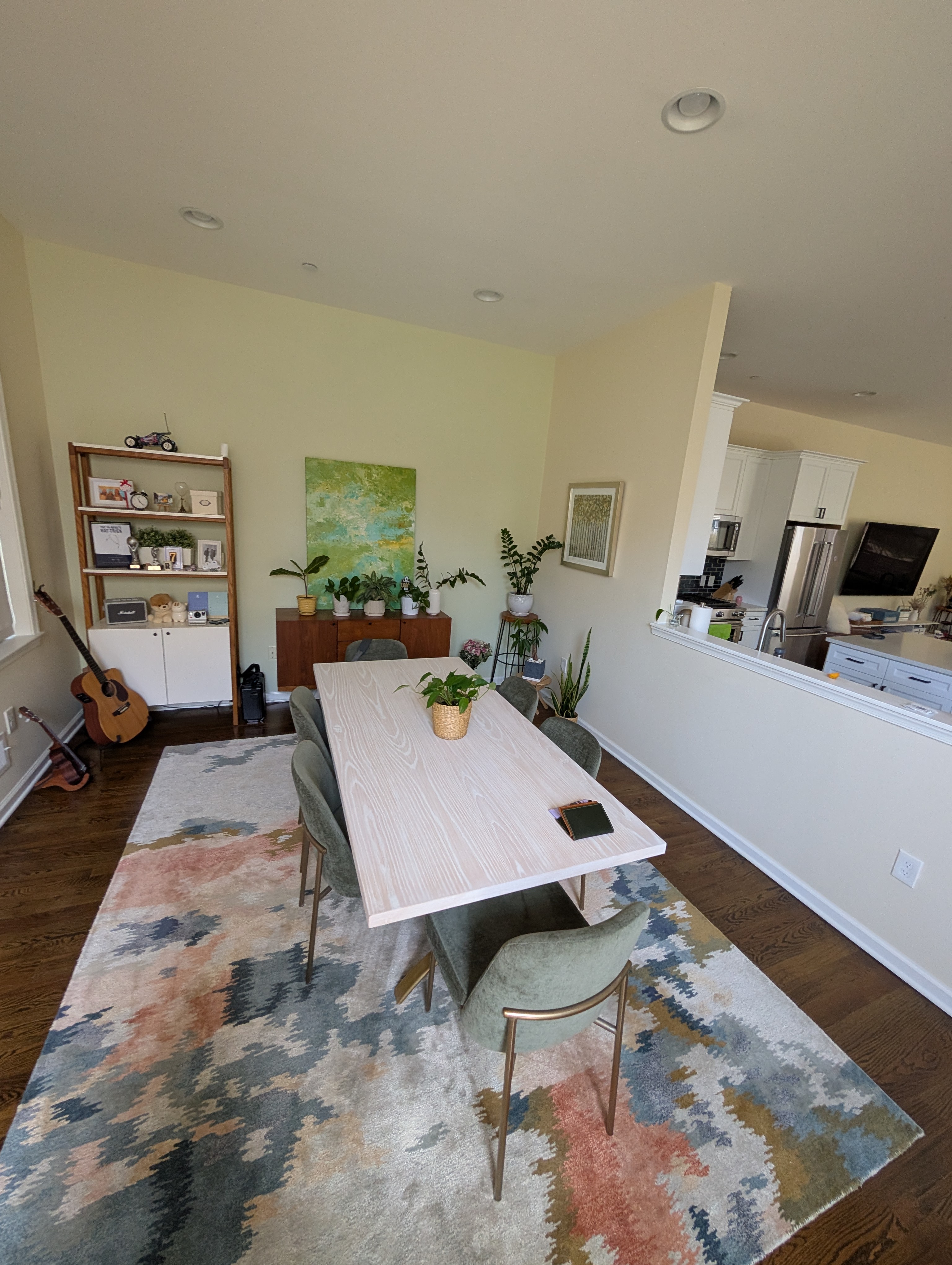 Dining room wide view with kitchen